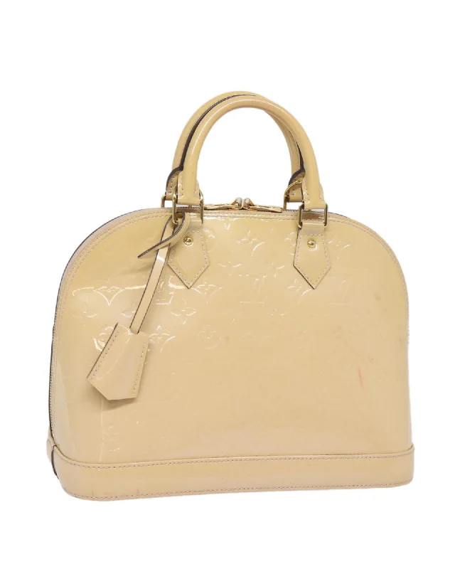 Monogram Vernis Alma PM Patent Leather Hand Bag with Key and Clochette