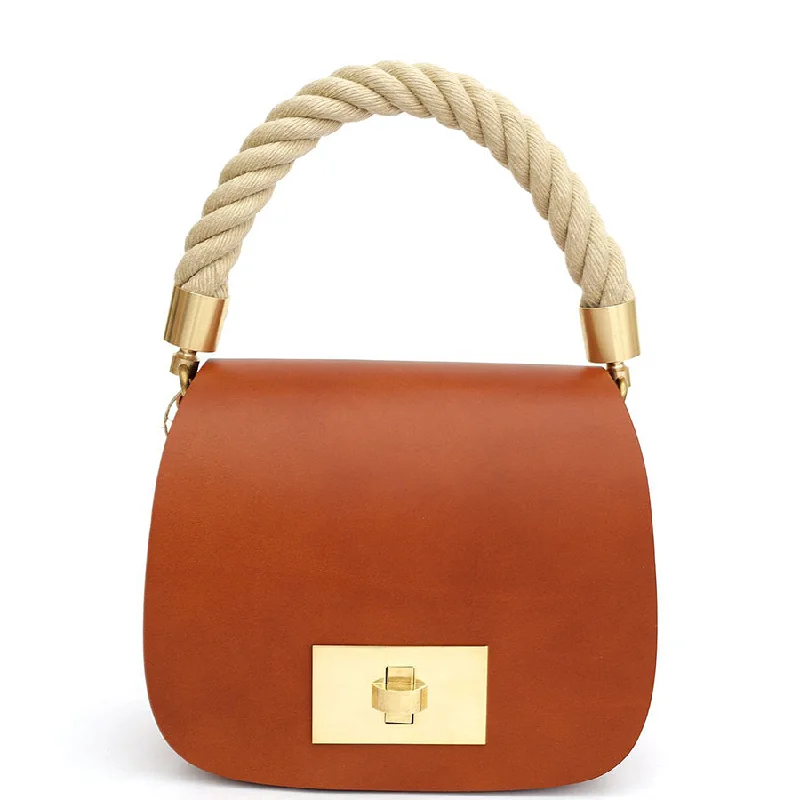 VEGETABLE TANNED LEATHER BAG "THE SADDLE" IN COGNAC